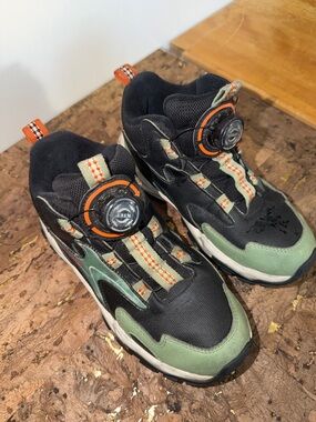 Kids XStep Green and Black Athletic Sneakers with Orange Accents